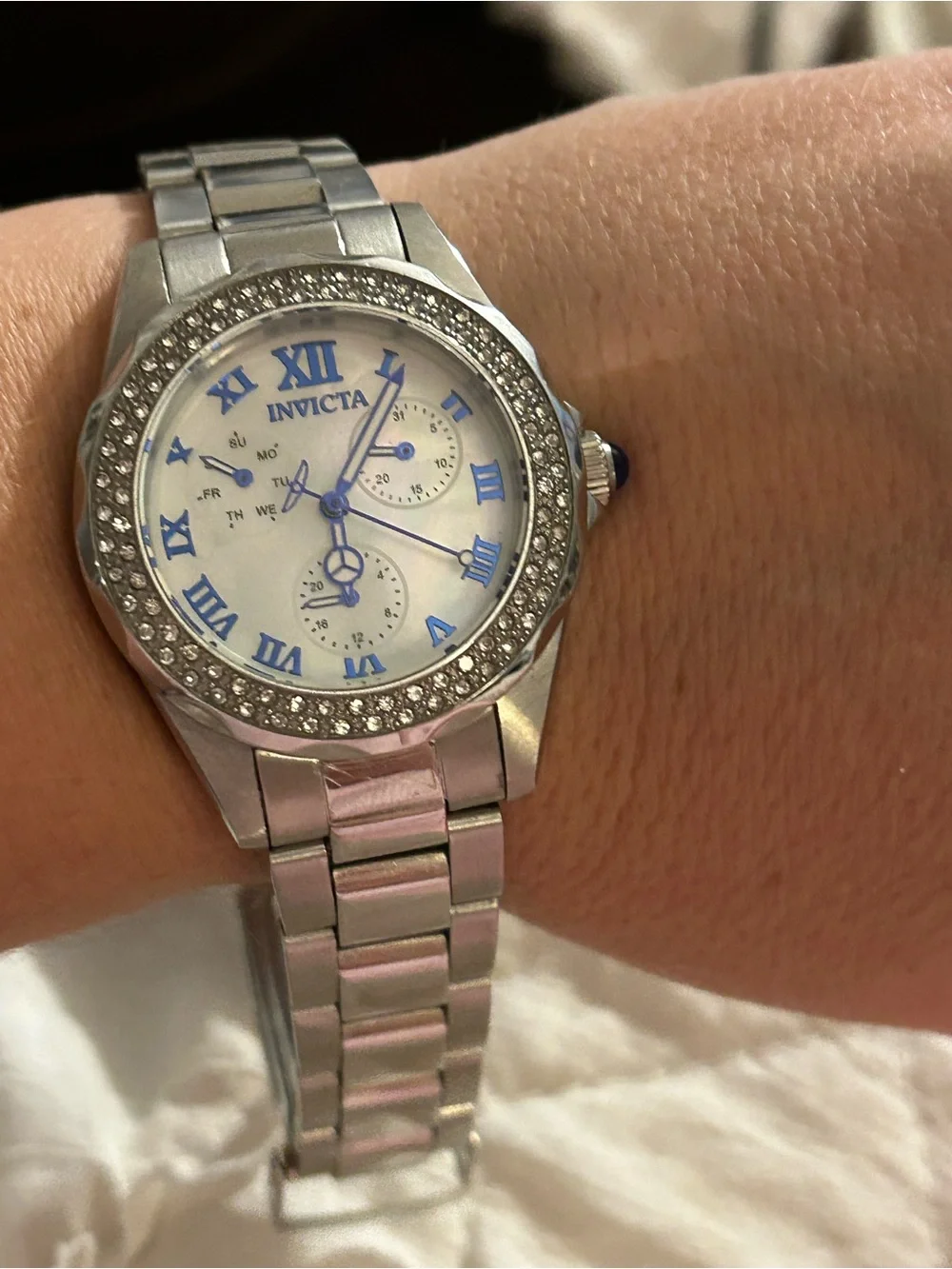 Invicta Silver Watch with Blue Accents and Crystal Bezel